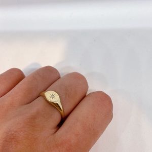 SOLID GOLD AND DIAMOND STAR SIGNET RING